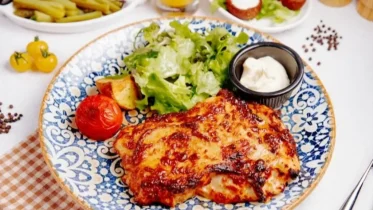 Imagen de la noticia: La mejor receta italiana: Así se prepara un cremoso pollo a la parmesana